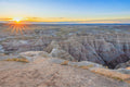 Sunset over a desert landscape with rocky formations