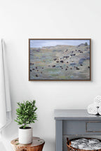 Fine art photography print of a wild bison herd grazing on North Dakota sagebrush hills with a purple and sage green landscape palette.